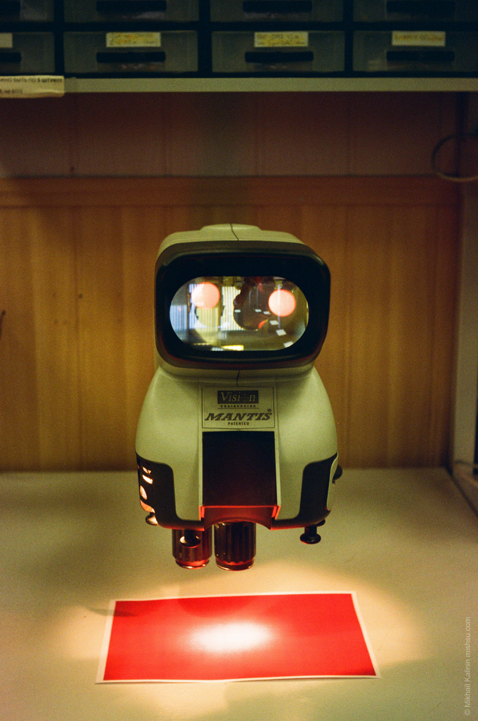 Microscope And Red Paper